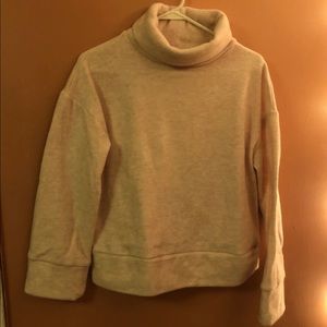 Pink turtleneck sweater